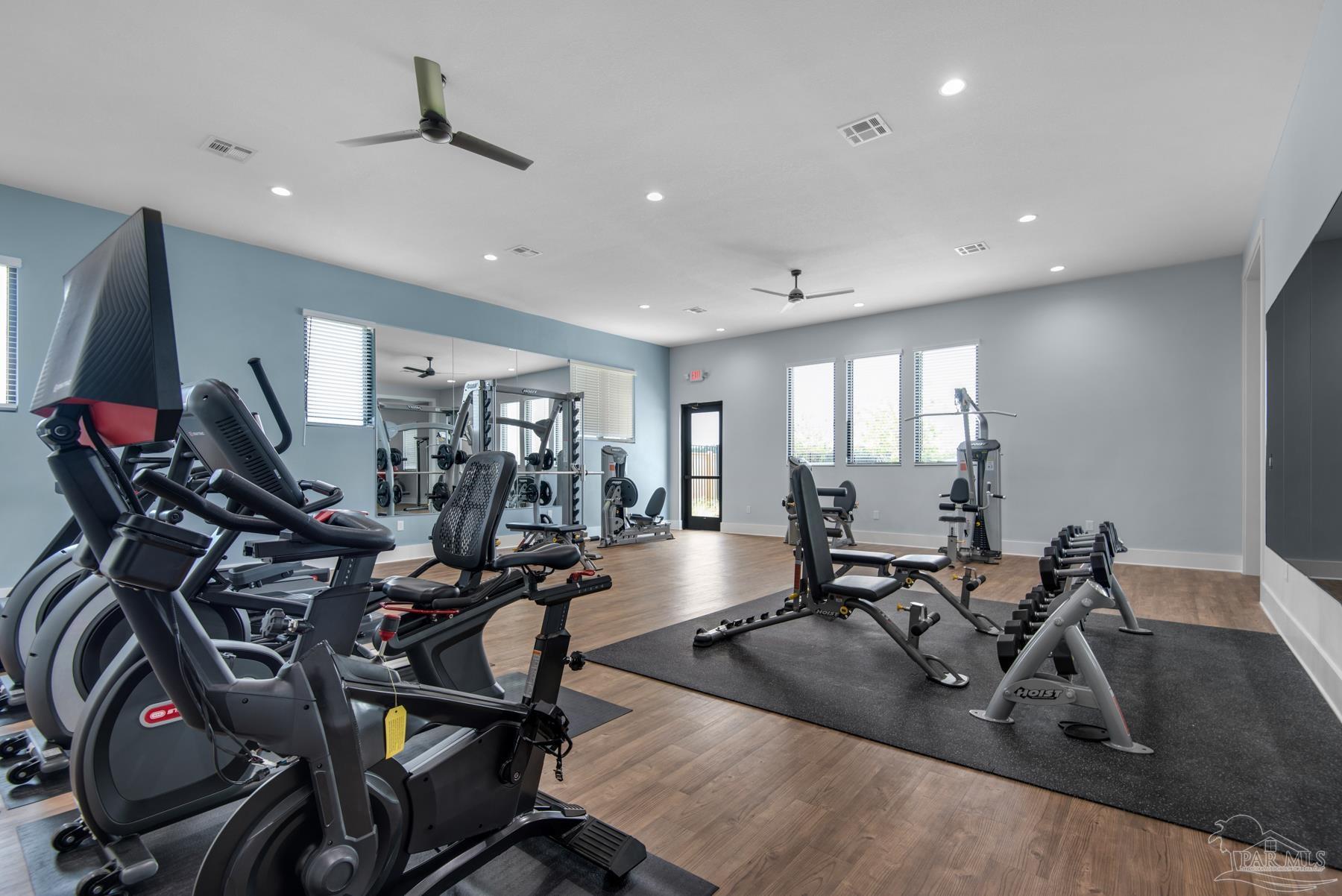 4639 Eider Road Pace, FL 32571 - Photo 25 of 27 a view of a room with gym equipment