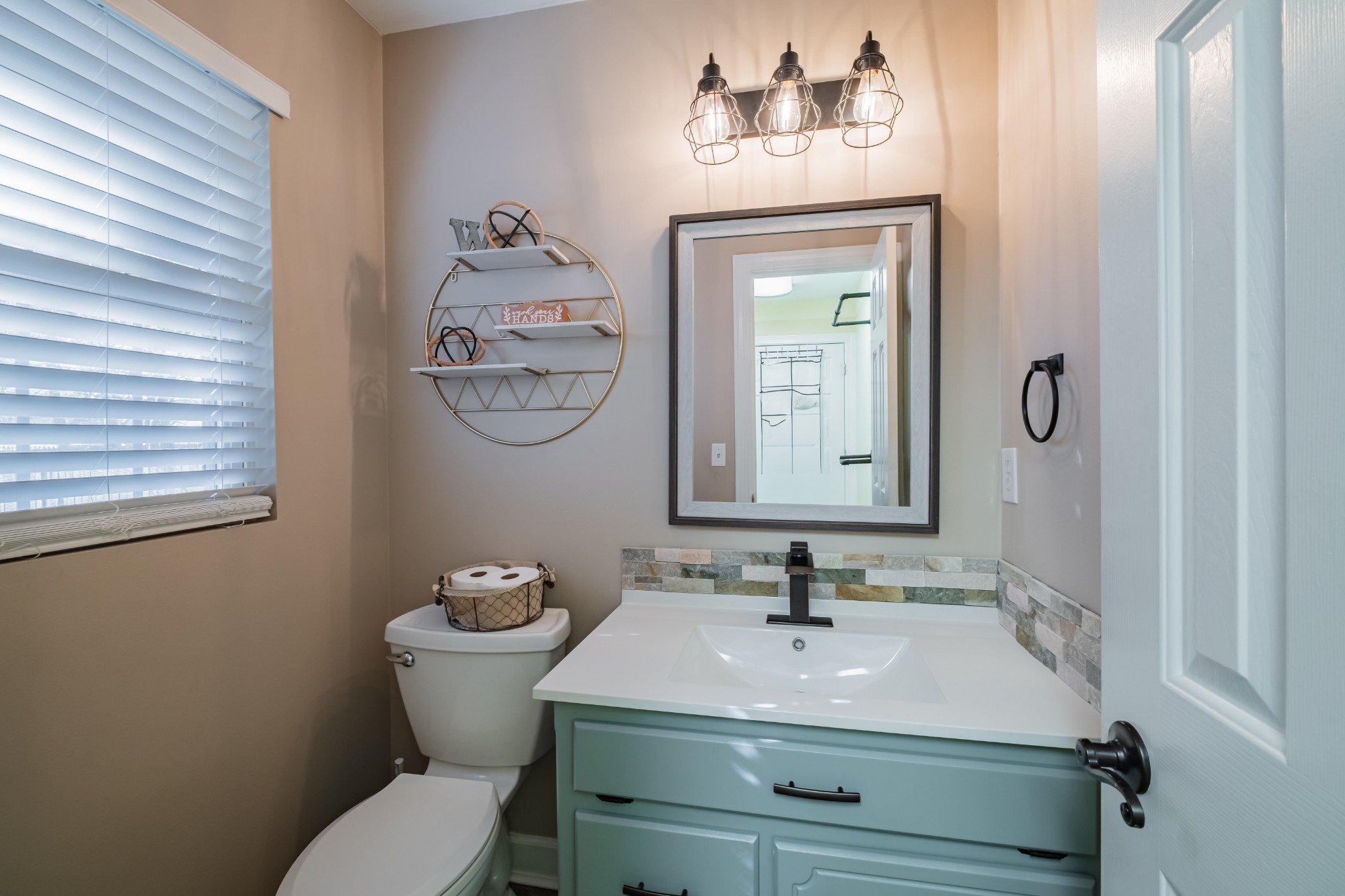 102 Point Drive Tullahoma, TN 37388 - Photo 20 of 29 a bathroom with a sink mirror and toilet