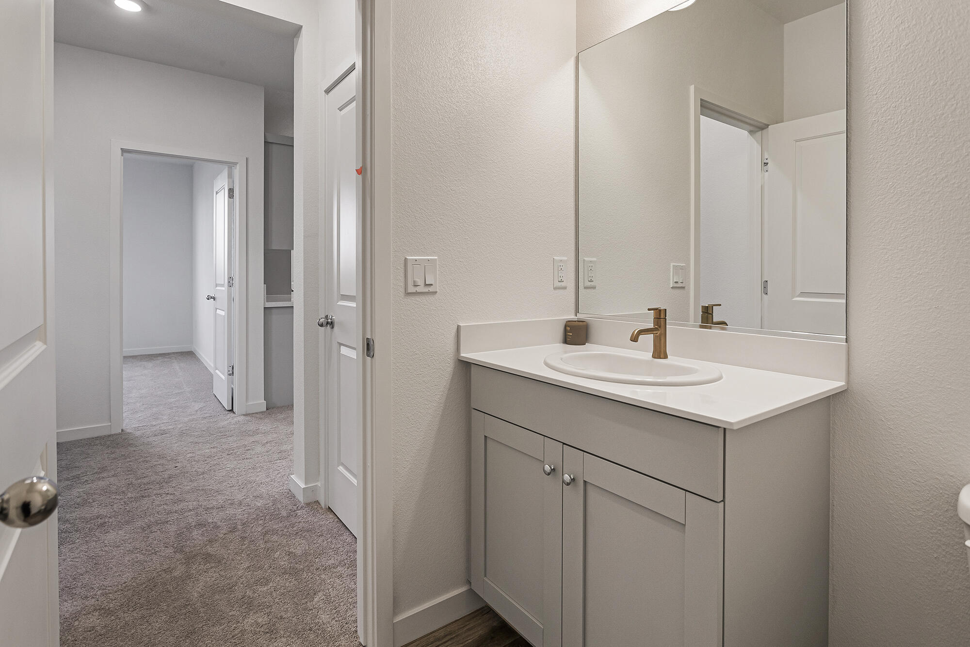 2293 Milano Trail Redding, CA 96003 - Photo 19 of 44 a bathroom with a sink and a mirror