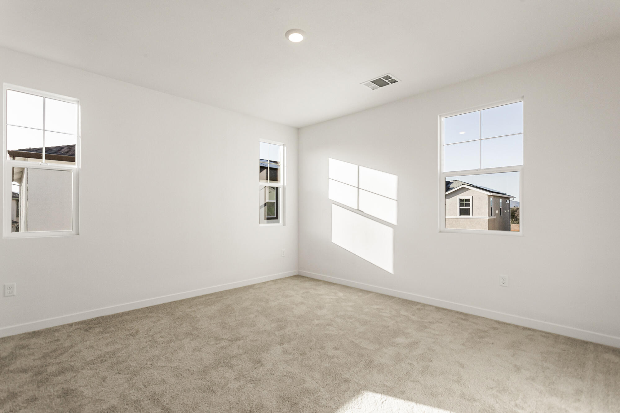 2293 Milano Trail Redding, CA 96003 - Photo 23 of 44 an empty room with windows