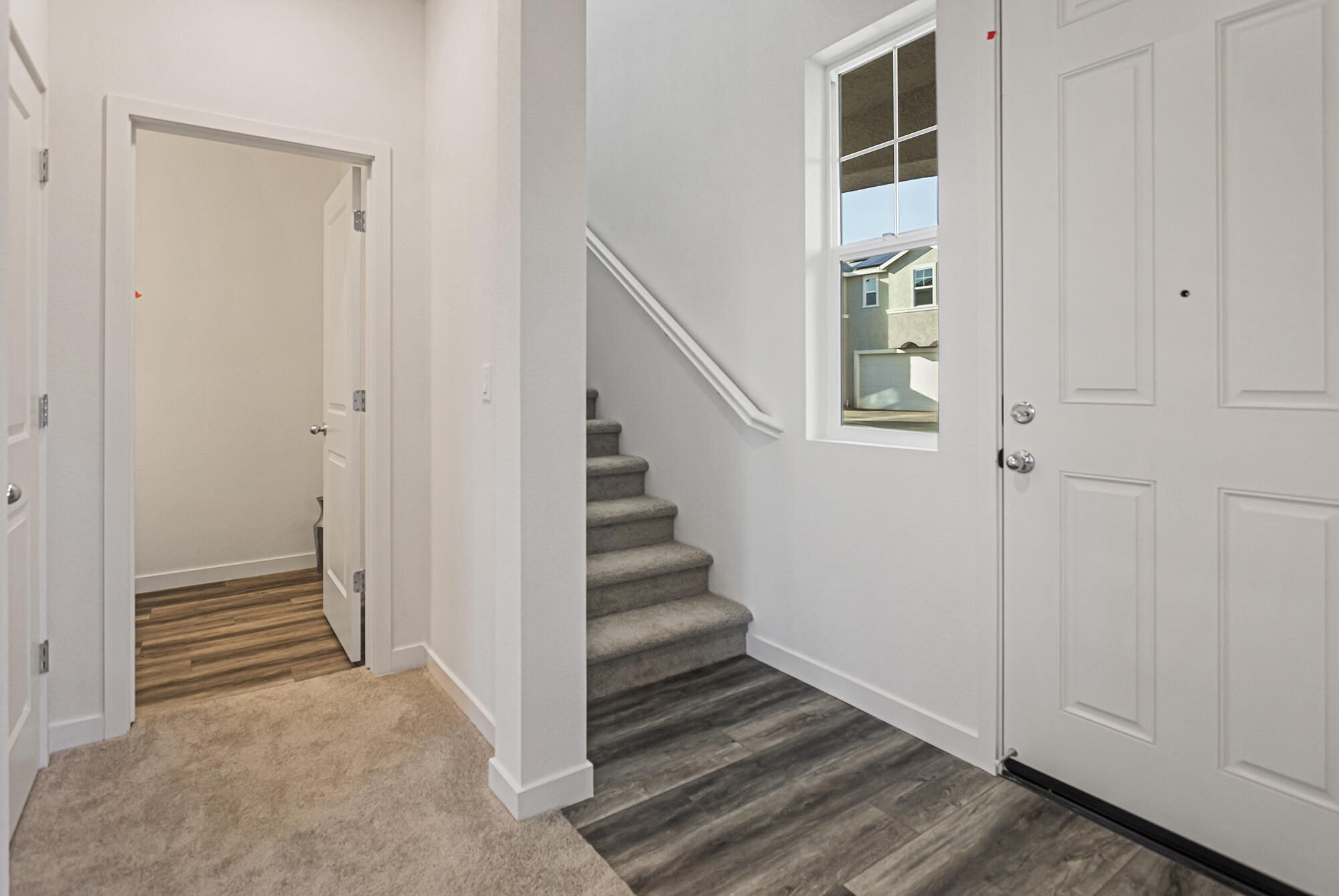 2293 Milano Trail Redding, CA 96003 - Photo 4 of 44 a view of entryway and hall with wooden floor