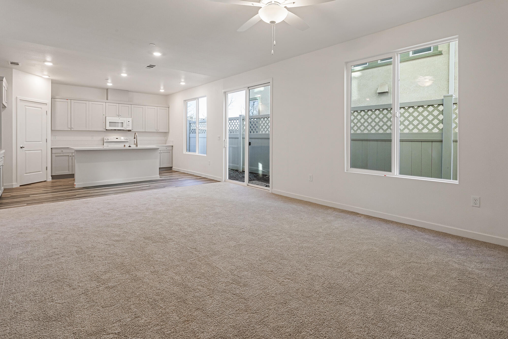 2293 Milano Trail Redding, CA 96003 - Photo 6 of 44 a view of an empty room with a kitchen