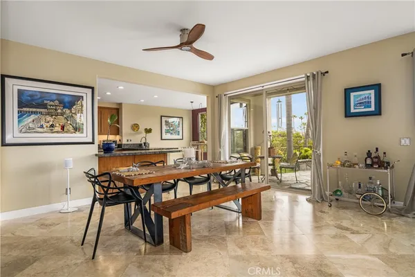 a kitchen with granite countertop sink stove and cabinets