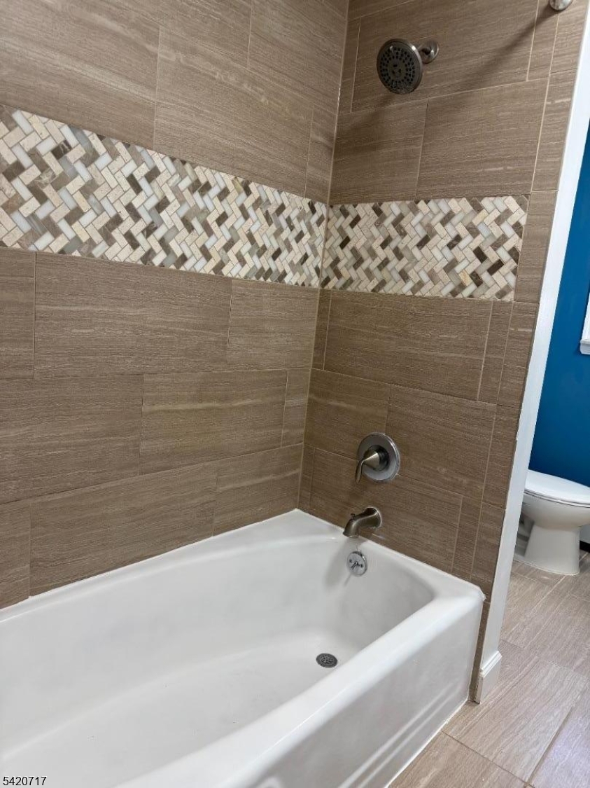 2538 Spruce Street, Unit 2 Union, NJ 07083 - Photo 11 of 29 a bathroom with a bathtub