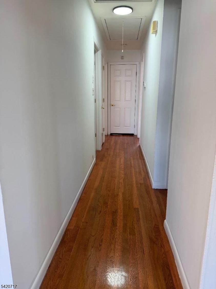 2538 Spruce Street, Unit 2 Union, NJ 07083 - Photo 23 of 29 a view of a hallway with wooden floor