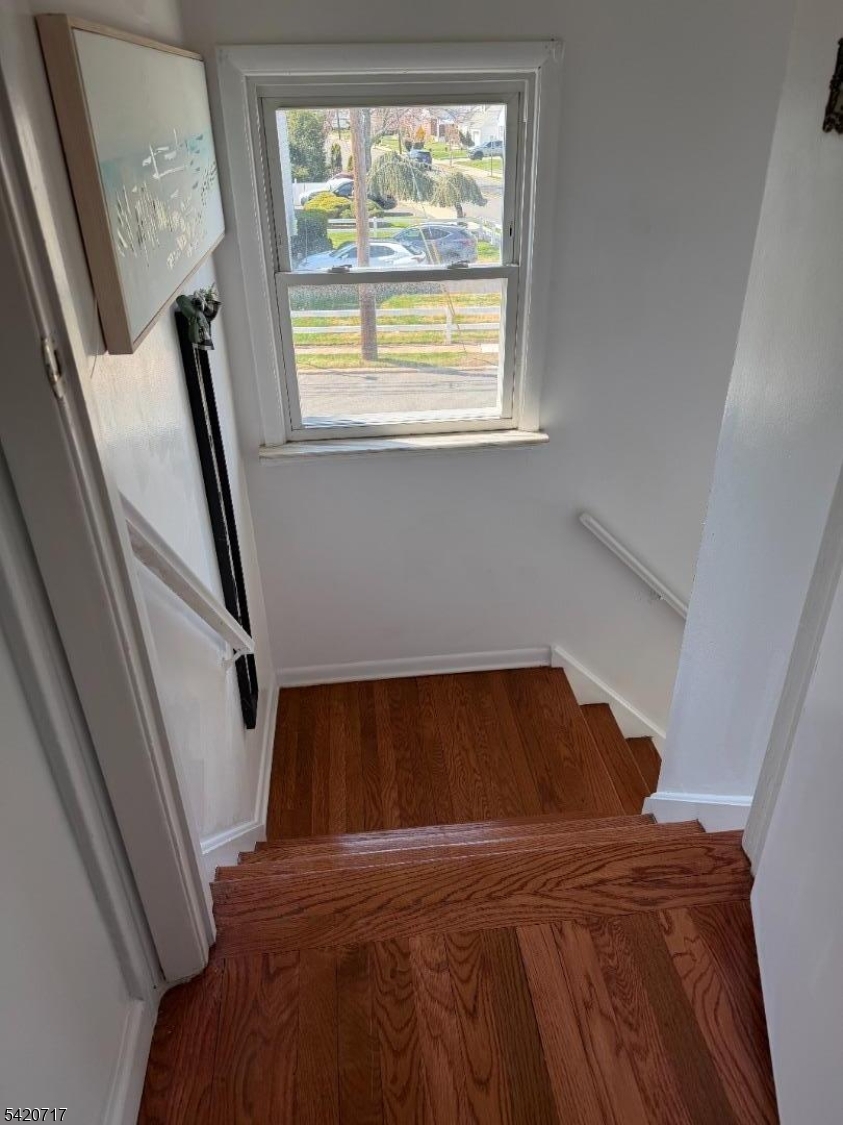 2538 Spruce Street, Unit 2 Union, NJ 07083 - Photo 10 of 29 a bed sitting in a bedroom next to a window