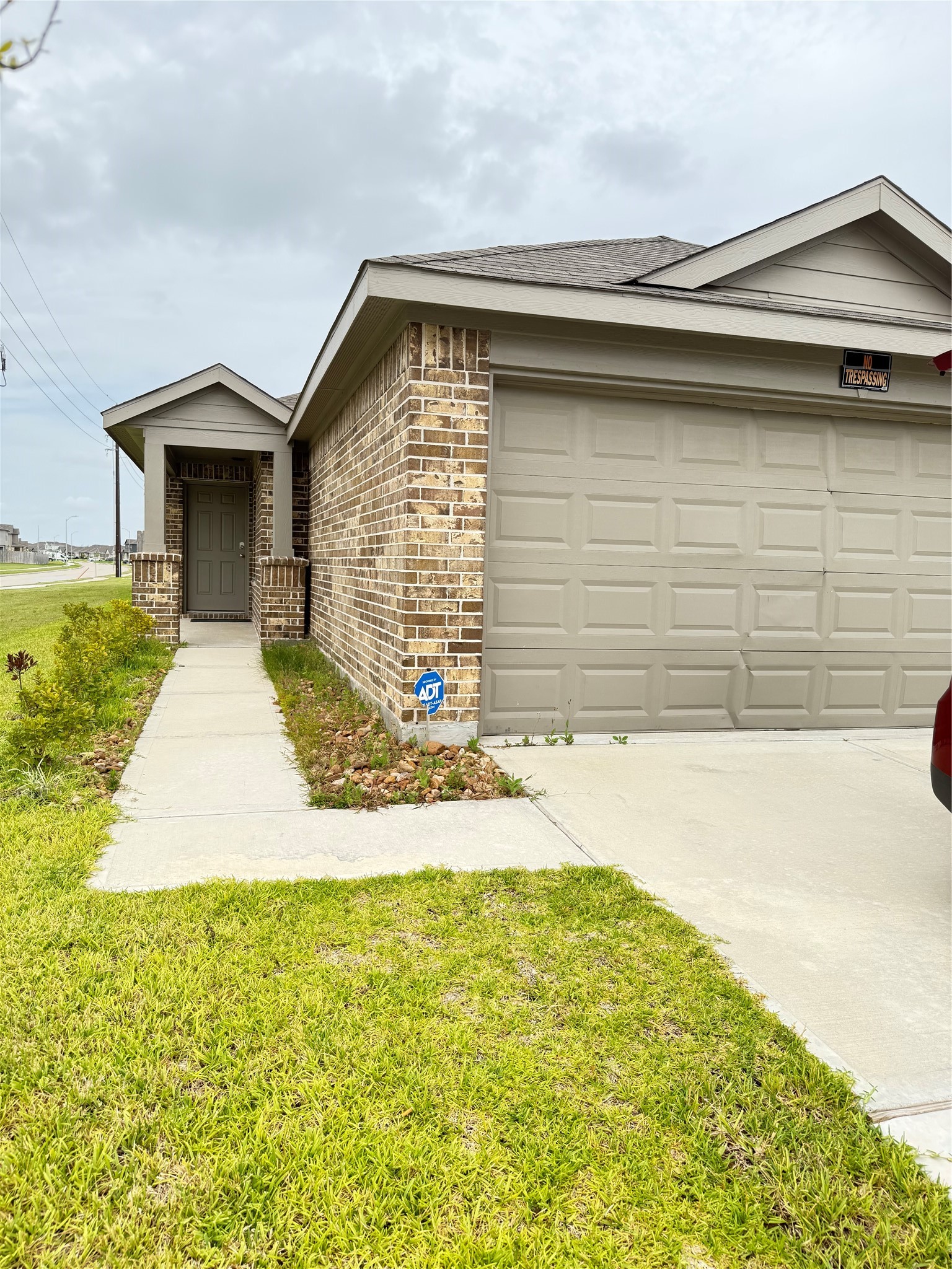 24203 Saddlestone Green Drive Spring, TX 77373 - Photo 2 of 8 a front view of a house with a yard