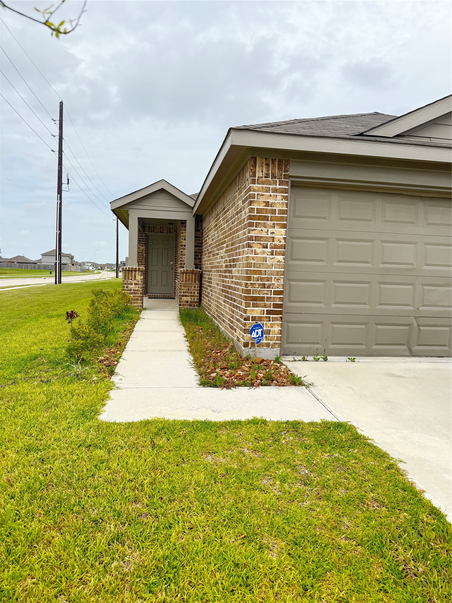 24203 Saddlestone Green Drive Spring, TX 77373 - Photo 3 of 8 a front view of a house with a yard