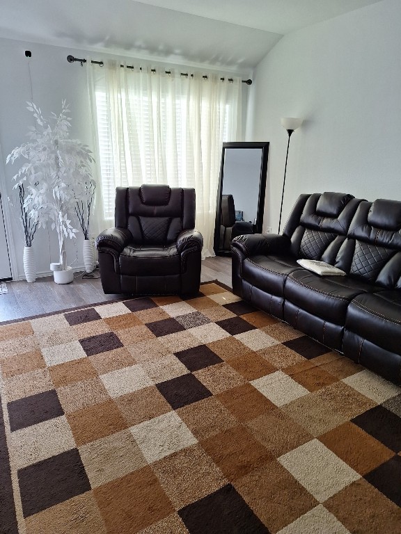 24203 Saddlestone Green Drive Spring, TX 77373 - Photo 5 of 8 a living room with a black white checkered floor with a black white checkered floor