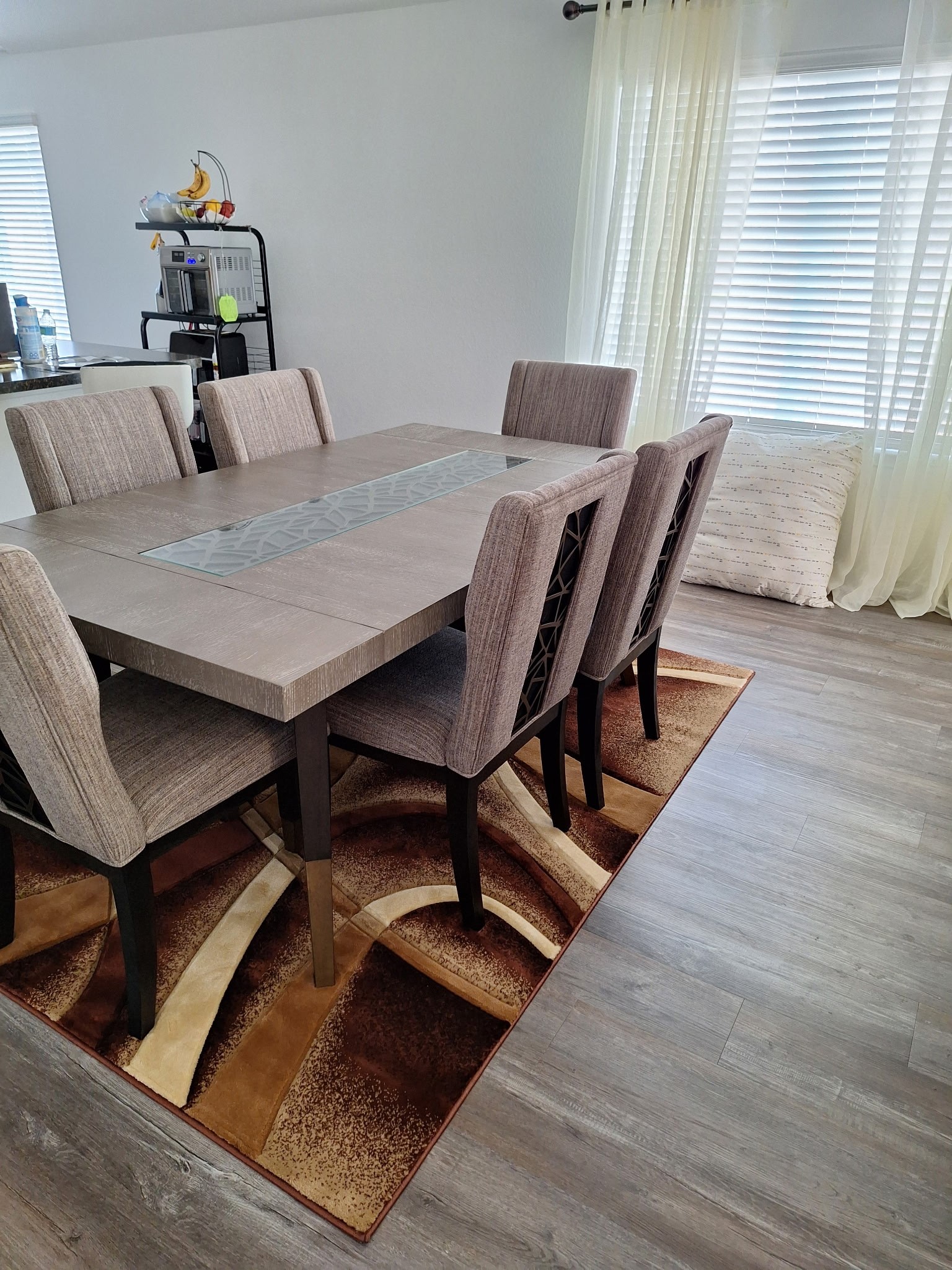 24203 Saddlestone Green Drive Spring, TX 77373 - Photo 6 of 8 a view of a dining room with furniture and wooden floor