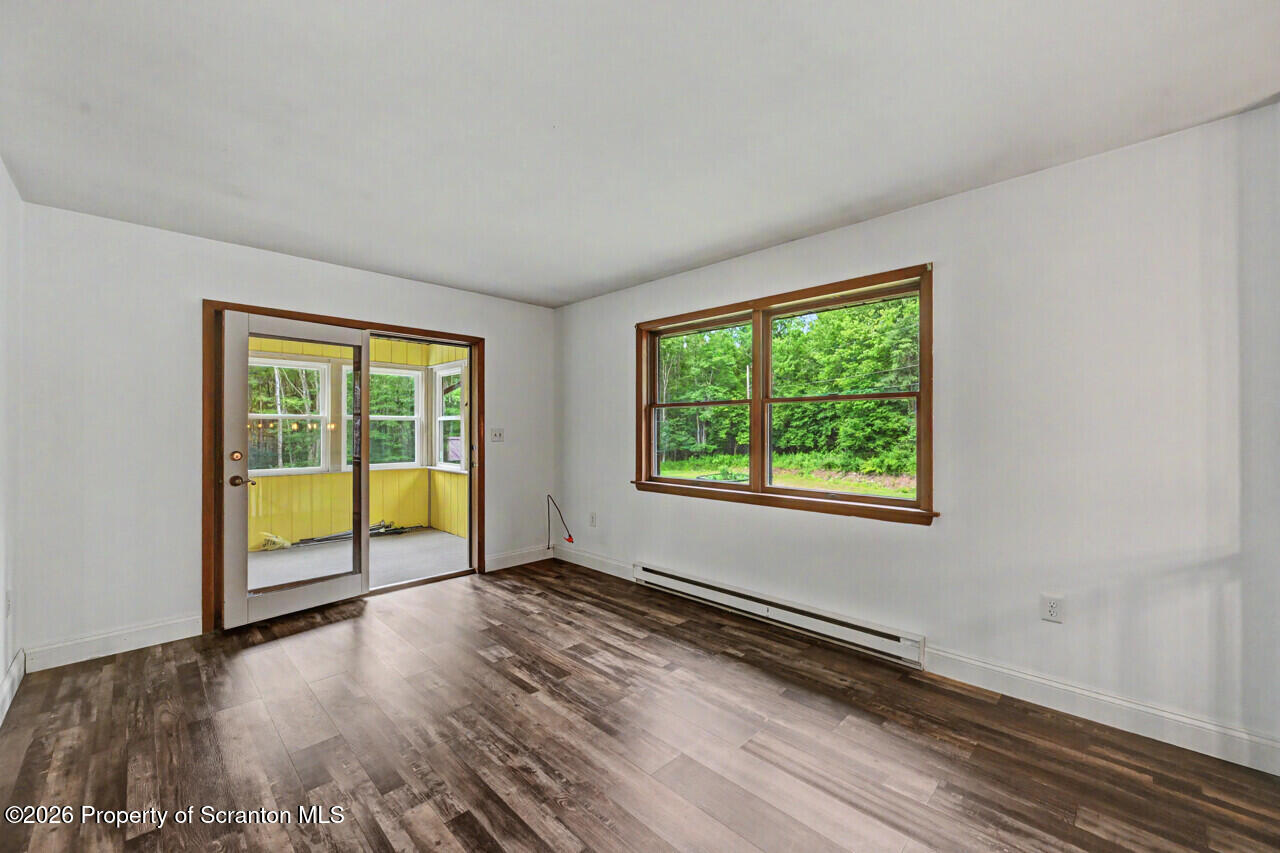 211 Buckingham Street Moscow, PA 18444 - Photo 17 of 83 a view of an empty room and window