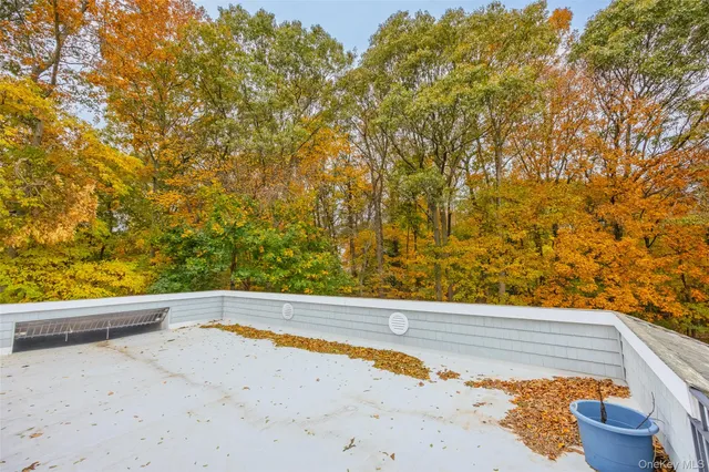 a view of a bathtub and an outdoor space