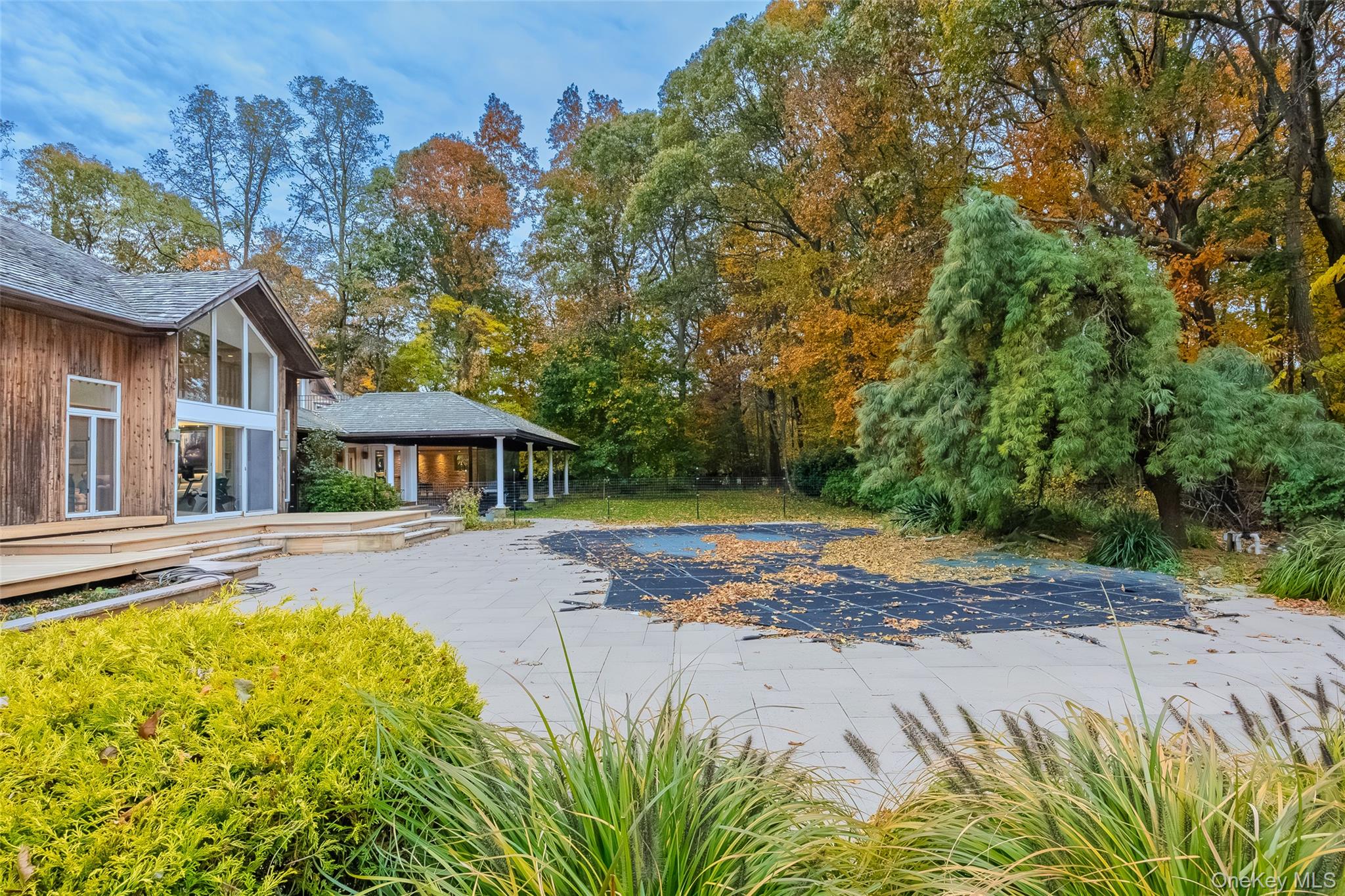 18 Golf Club Road St. James, NY 11780 - Photo 34 of 47 a view of a house with pool and sitting area