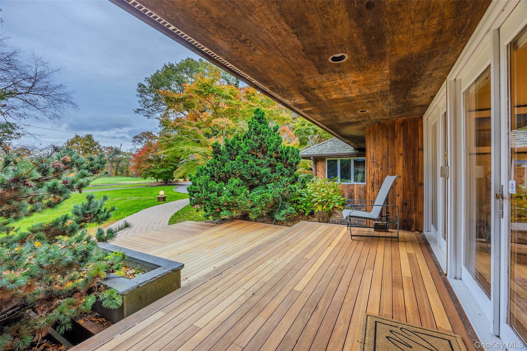18 Golf Club Road St. James, NY 11780 - Photo 4 of 47 a view of outdoor space with a patio