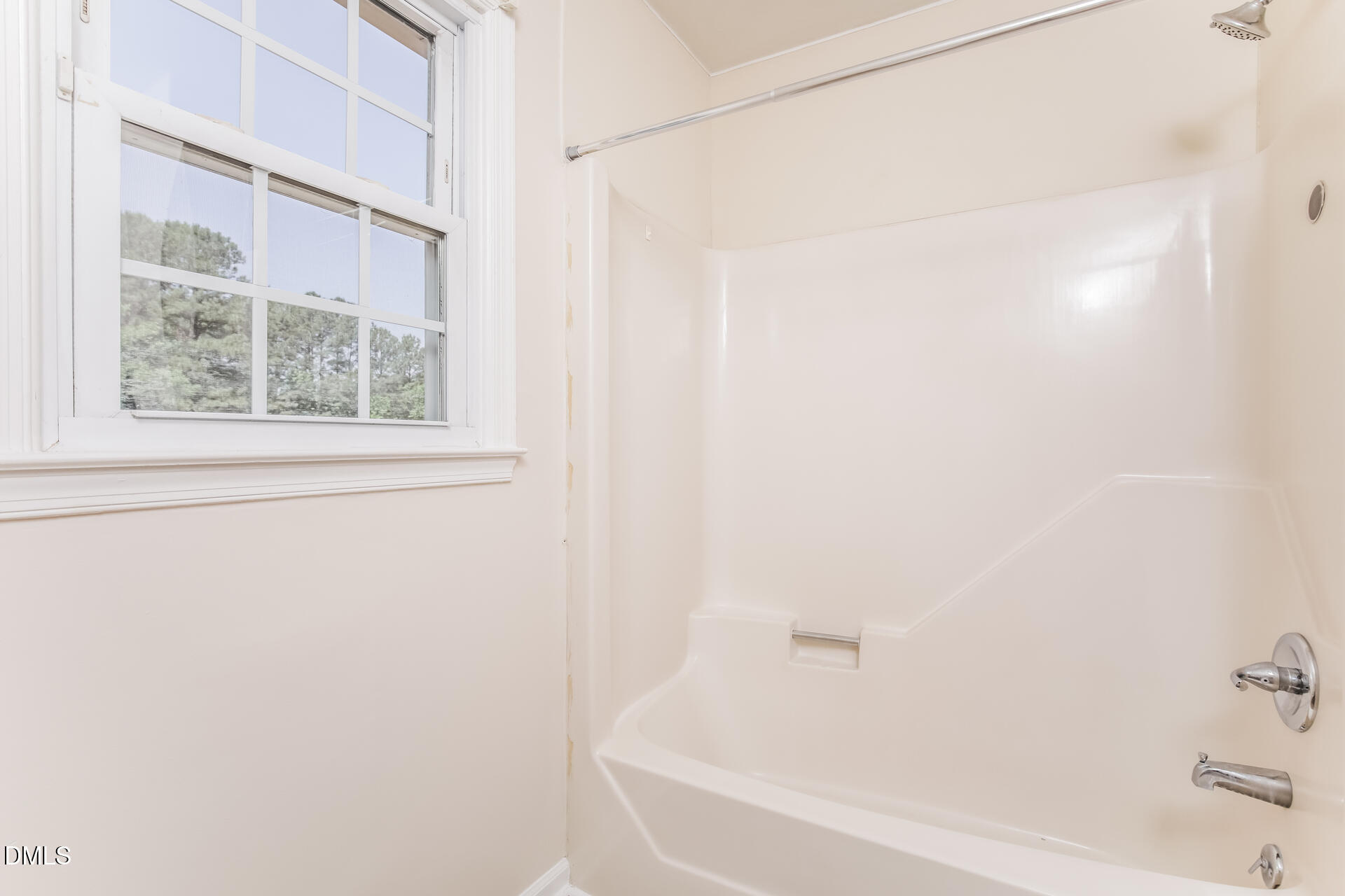 870 Abbott Road Henderson, NC 27537 - Photo 19 of 20 a white bath tub with a shower