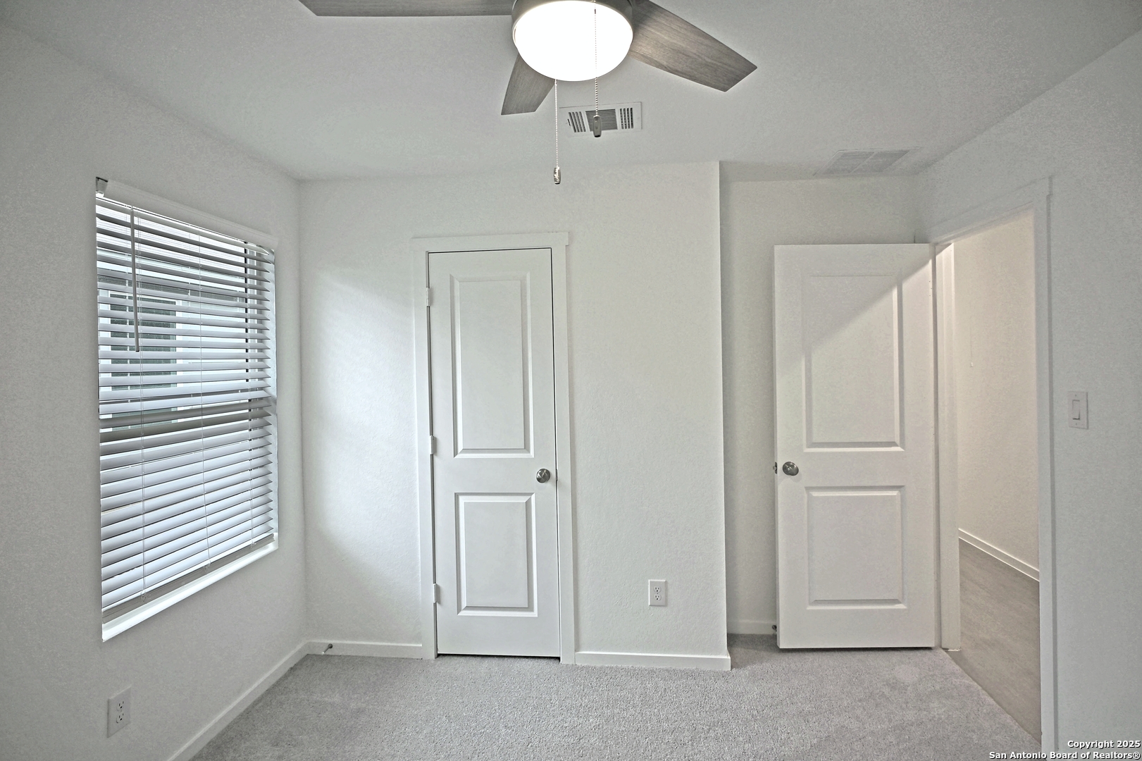 3805 Swift Fox Road New Braunfels, TX 78132 - Photo 13 of 27 a view of an empty room and window