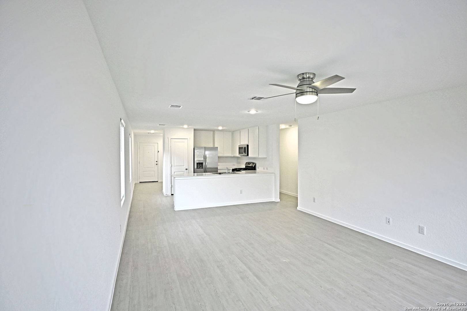 3805 Swift Fox Road New Braunfels, TX 78132 - Photo 16 of 27 a view of a kitchen with a sink and a window