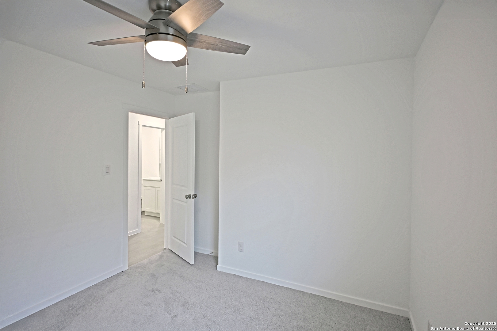 3805 Swift Fox Road New Braunfels, TX 78132 - Photo 9 of 27 wooden floor in an empty room