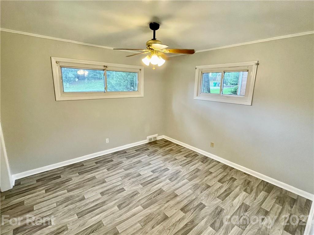 7125 Pence Road, Unit 2 Charlotte, NC 28215 - Photo 12 of 16 a view of empty room with wooden floor