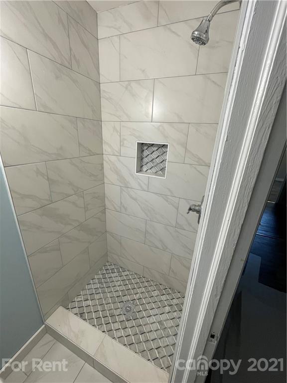 7125 Pence Road, Unit 2 Charlotte, NC 28215 - Photo 15 of 16 a bathroom with a shower