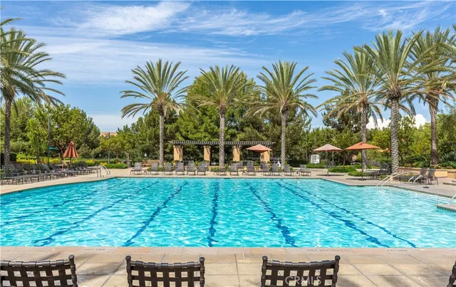a view of a swimming pool with a slide