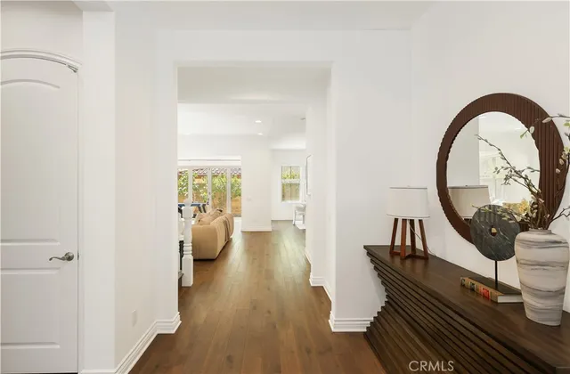 a view of a living room and dining room