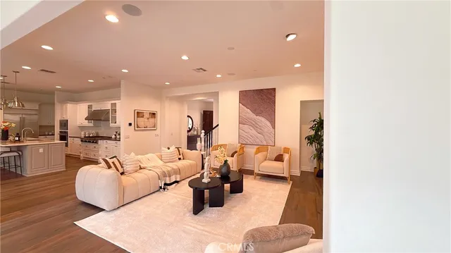 a living room with furniture and a table