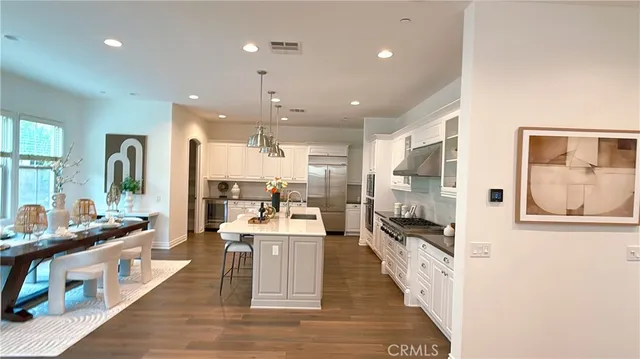 a large room with lot of gym equipment