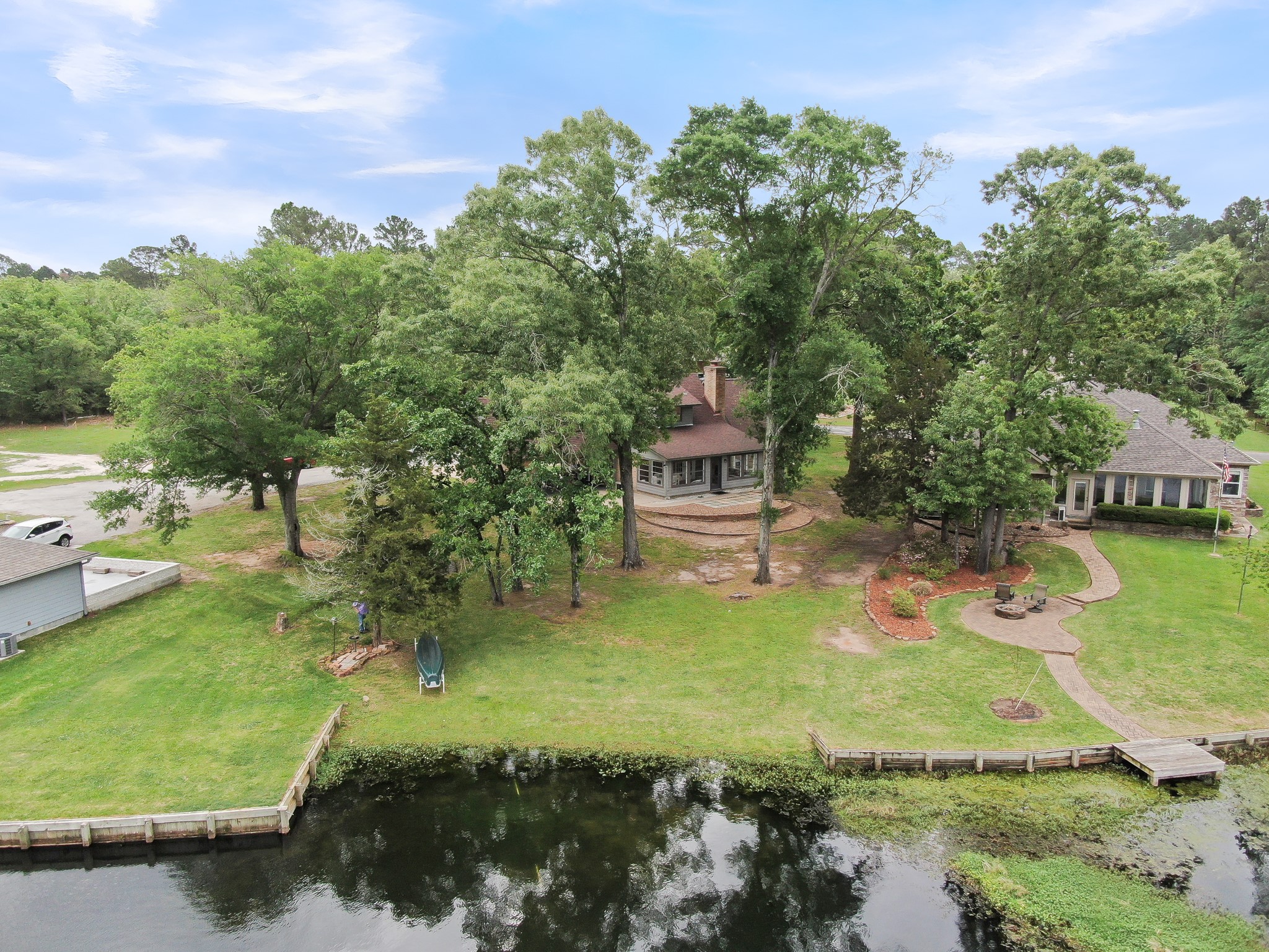 Rear view of home, showcasing the greenspace and lake view