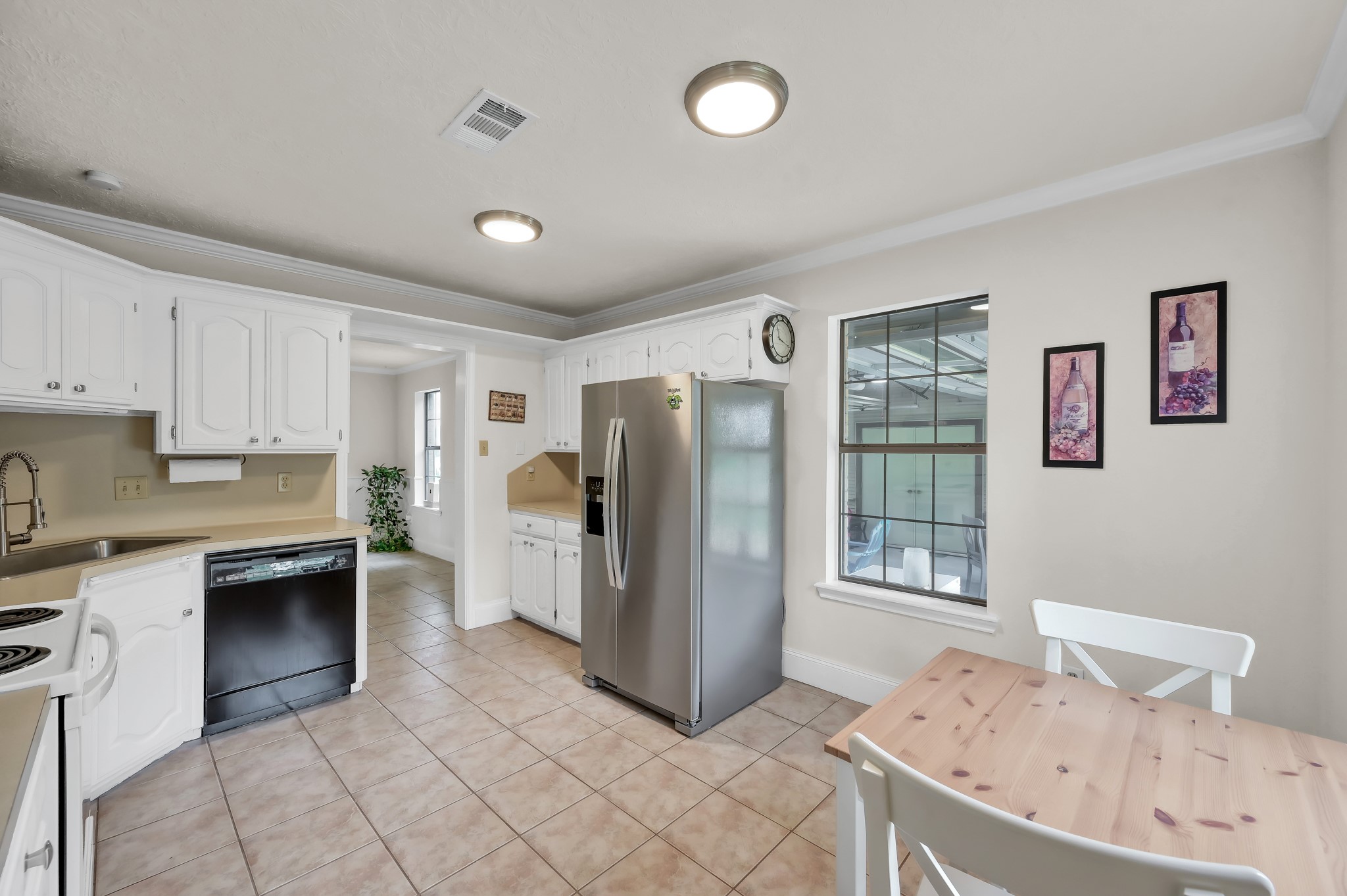 117 Brookside Drive Trinity, TX 75862 - Photo 14 of 46 Kitchen area with a cozy coffee nook, perfect for casual dining and morning coffee.