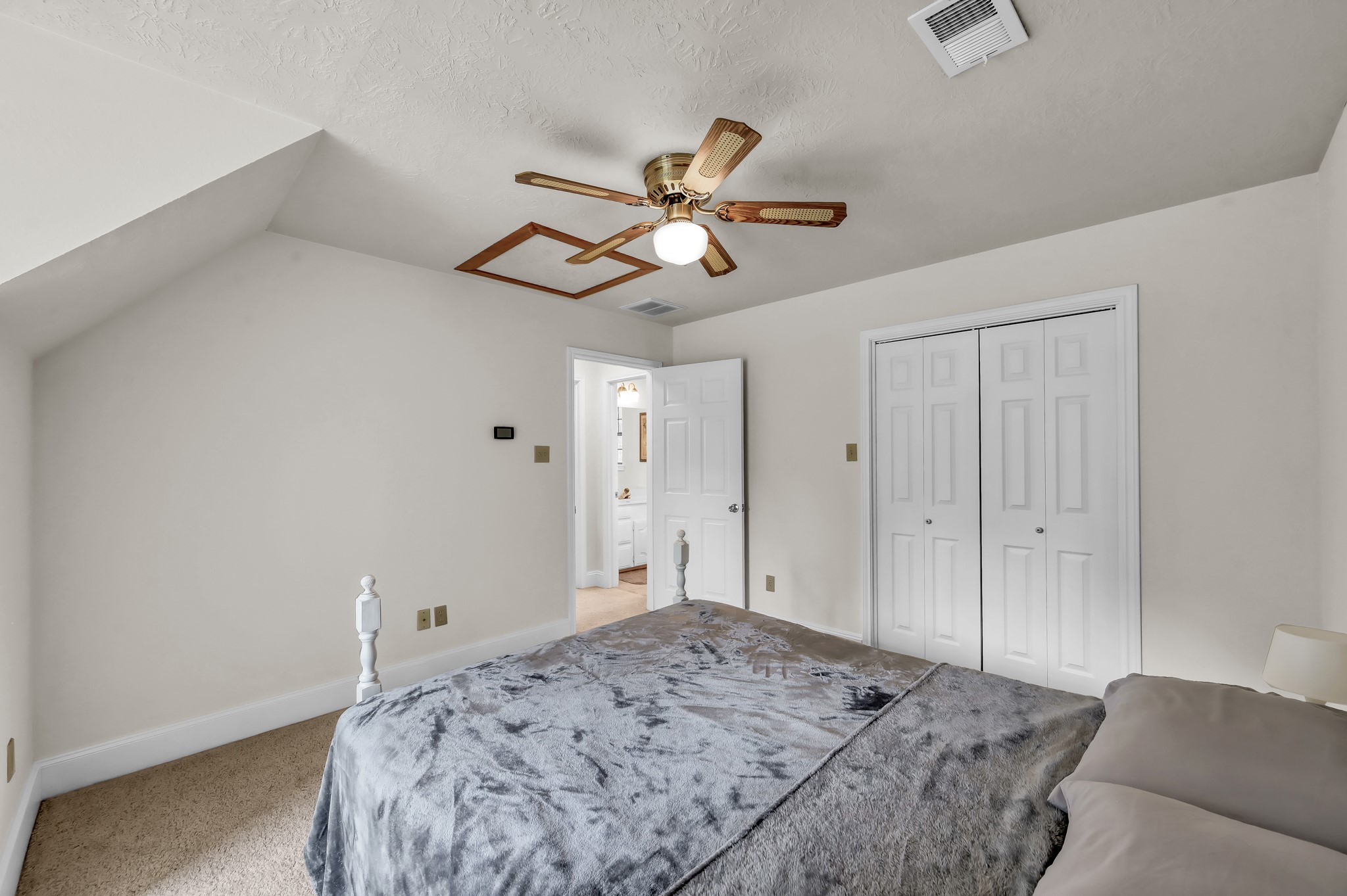 117 Brookside Drive Trinity, TX 75862 - Photo 24 of 46 This second view of the second upstairs bedroom emphasizes the open feel of the room while also showing the closet’s position.