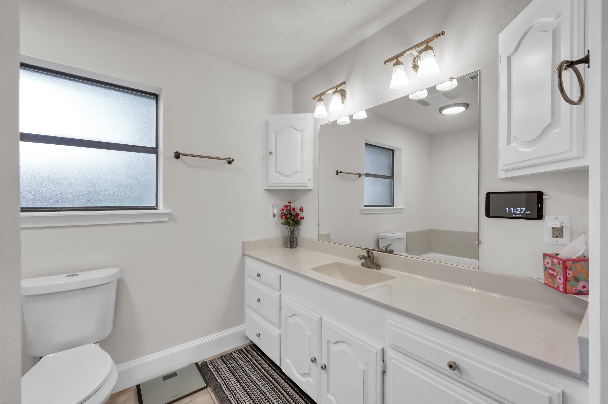 117 Brookside Drive Trinity, TX 75862 - Photo 26 of 46 a bathroom with a sink a toilet and mirror