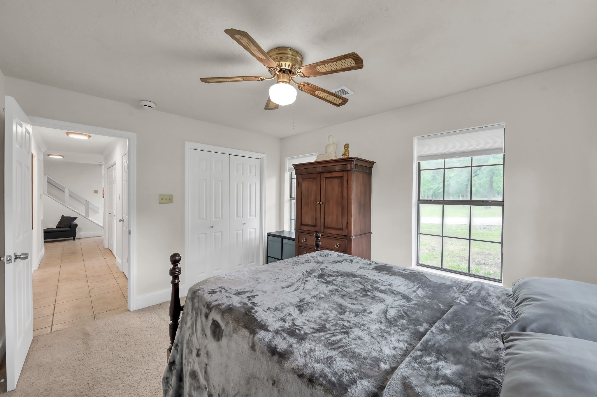 117 Brookside Drive Trinity, TX 75862 - Photo 29 of 46 a bedroom with a bed and a large window