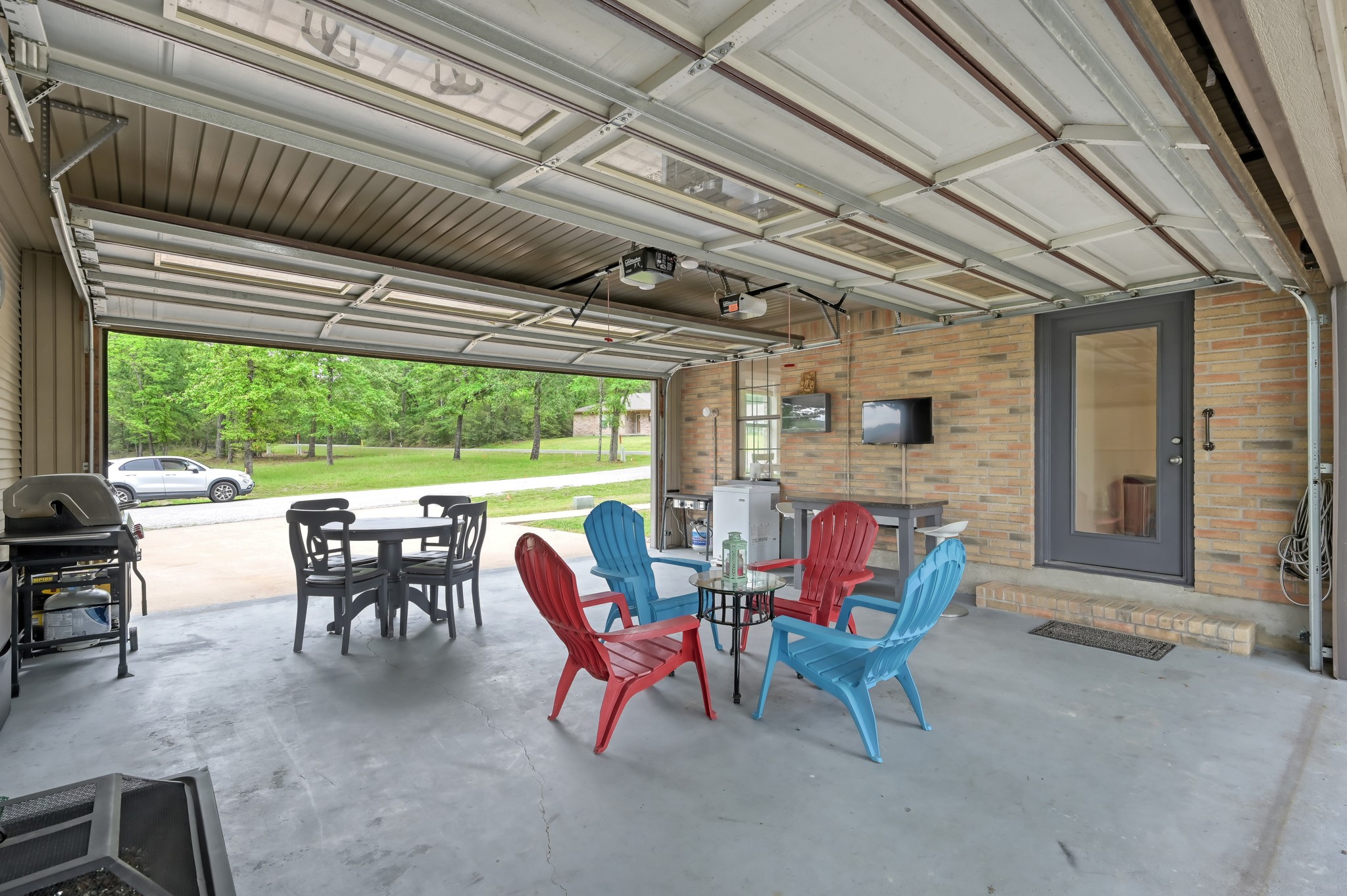 117 Brookside Drive Trinity, TX 75862 - Photo 6 of 46 Garage interior with a clear view of the front yard.