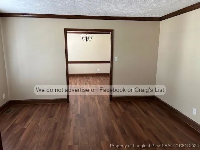 a view of a hardwood floor in a room