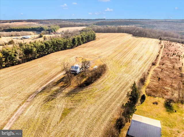 a view of an ocean and a mountain