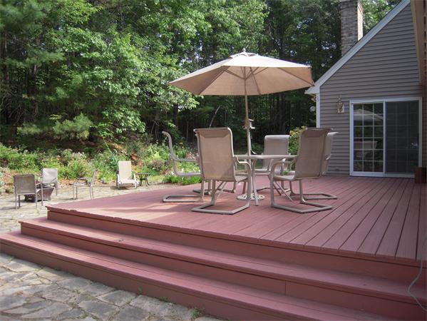 338 Robinson Road Boxborough, MA 01719 - Photo 14 of 18 a view of backyard with seating space and wooden floor