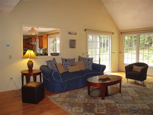 338 Robinson Road Boxborough, MA 01719 - Photo 4 of 18 a living room with furniture and a large window