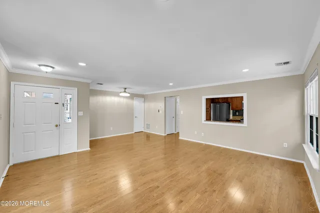 a kitchen with a refrigerator sink and microwave