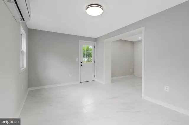 a bathroom with a sink double vanity and a mirror