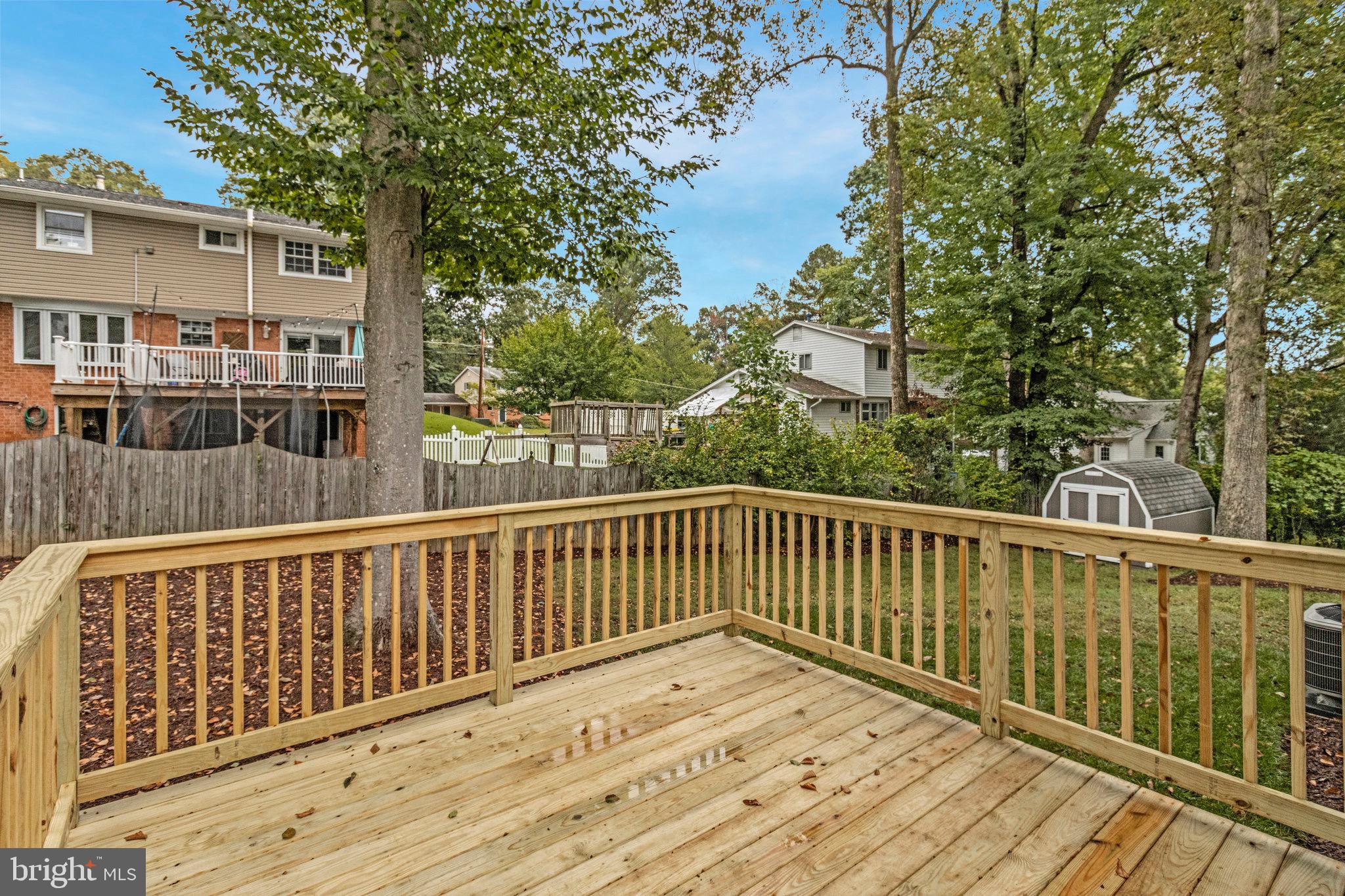 5511 Callander Drive Springfield, VA 22151 - Photo 65 of 74 a view of balcony with wooden floor and fence