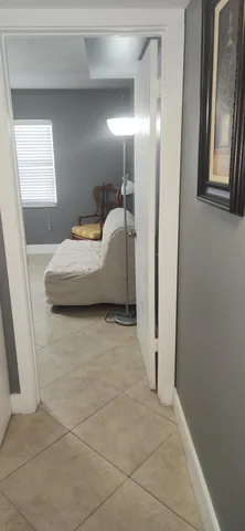 a view of lobby with mirror