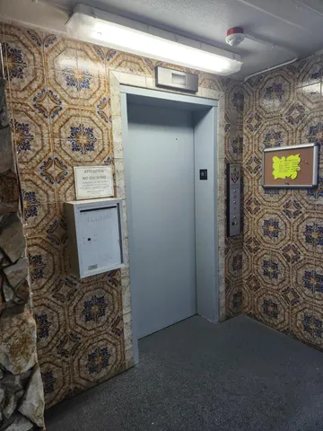 a bathroom with a toilet and a sink