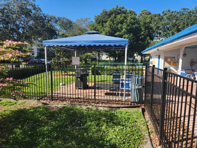a view of a wrought iron fences in front of house