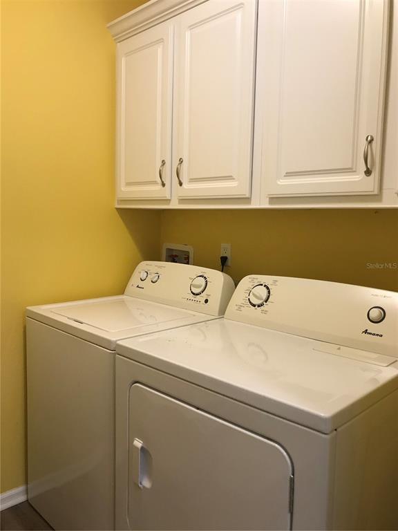 1081 6th Street Okeechobee, FL 34974 - Photo 15 of 22 a utility room with dryer and washer