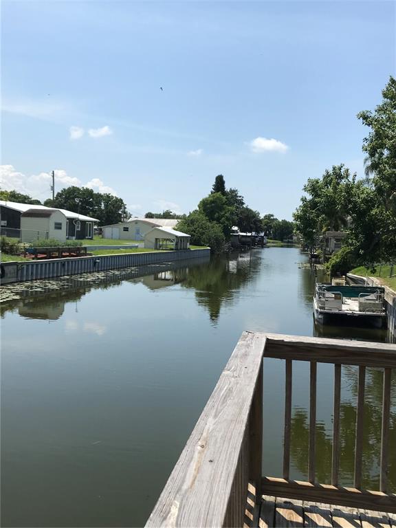 1081 6th Street Okeechobee, FL 34974 - Photo 22 of 22 a view of a lake from a balcony