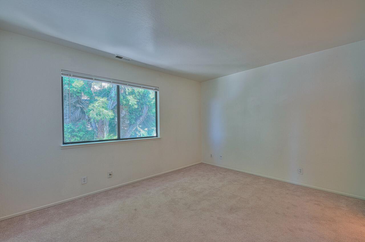225 Silver Leaf Drive, Unit C Watsonville, CA 95076 - Photo 13 of 24 an empty room with a window