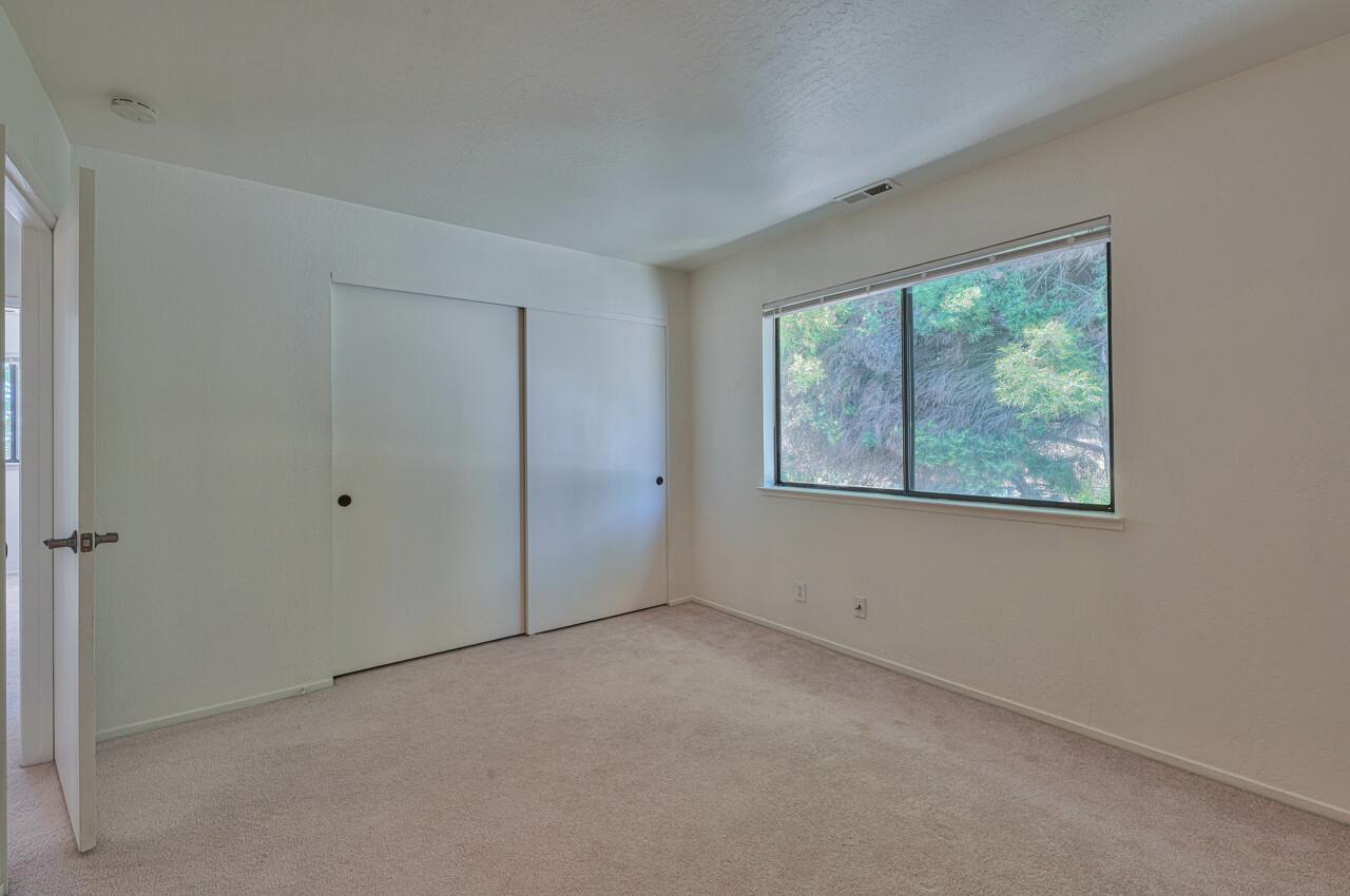 225 Silver Leaf Drive, Unit C Watsonville, CA 95076 - Photo 14 of 24 an empty room with windows