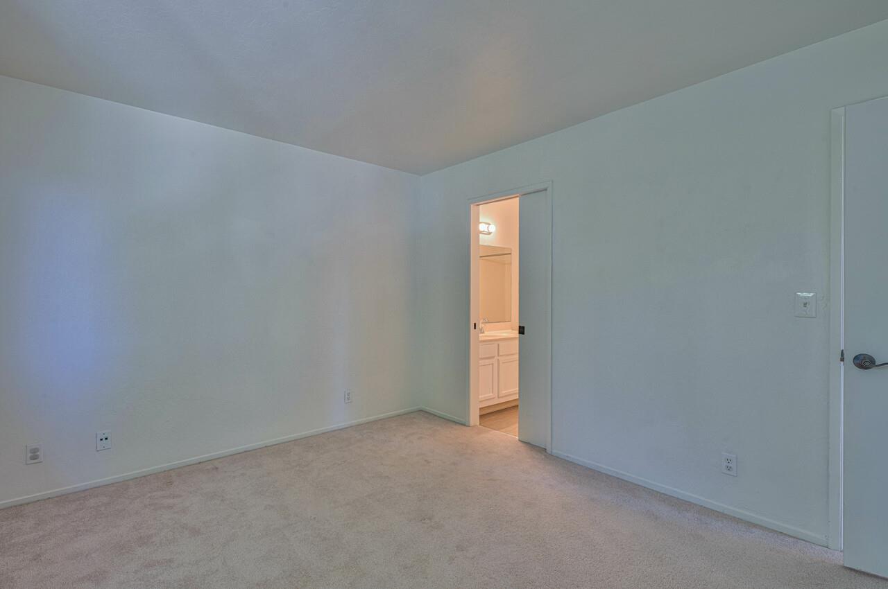 225 Silver Leaf Drive, Unit C Watsonville, CA 95076 - Photo 15 of 24 a view of an empty room and a window