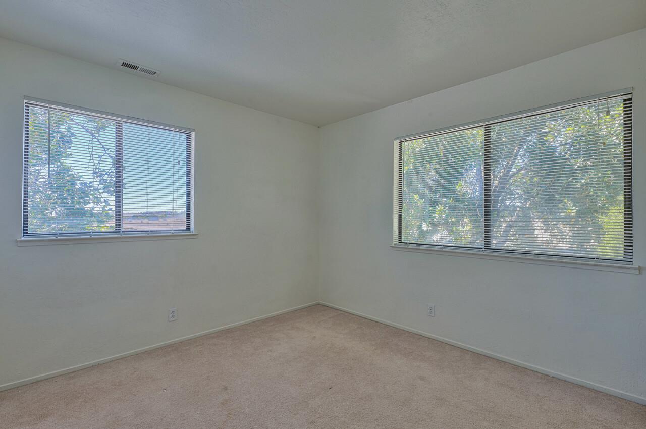 225 Silver Leaf Drive, Unit C Watsonville, CA 95076 - Photo 19 of 24 an empty room with a window
